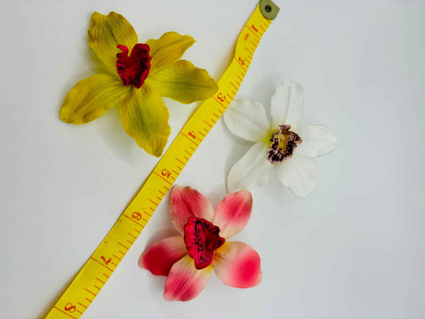 Karin's Garden "Margaret" 2" Mini Vanda Orchid pinch clip. Easily clip into hair. Enjoy on your tropical vacation. Bendable Petals. A top seller