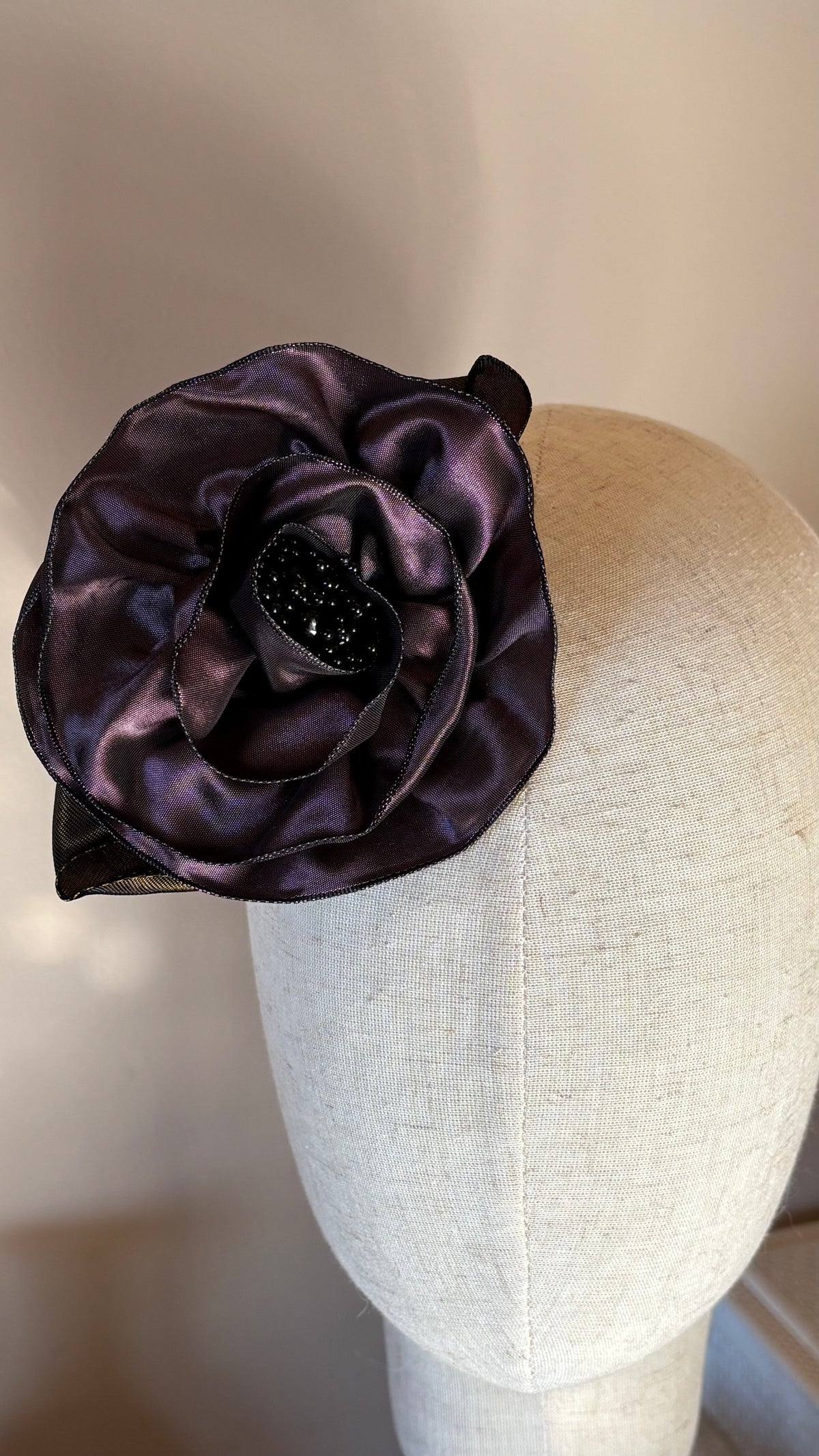 Francesca Petite Brooch & Clip in Plum. Pin or Clip to dresses, lapels, handbag or hat. Made in the USA. You can reshape the flower and leaves. Taffeta from France.