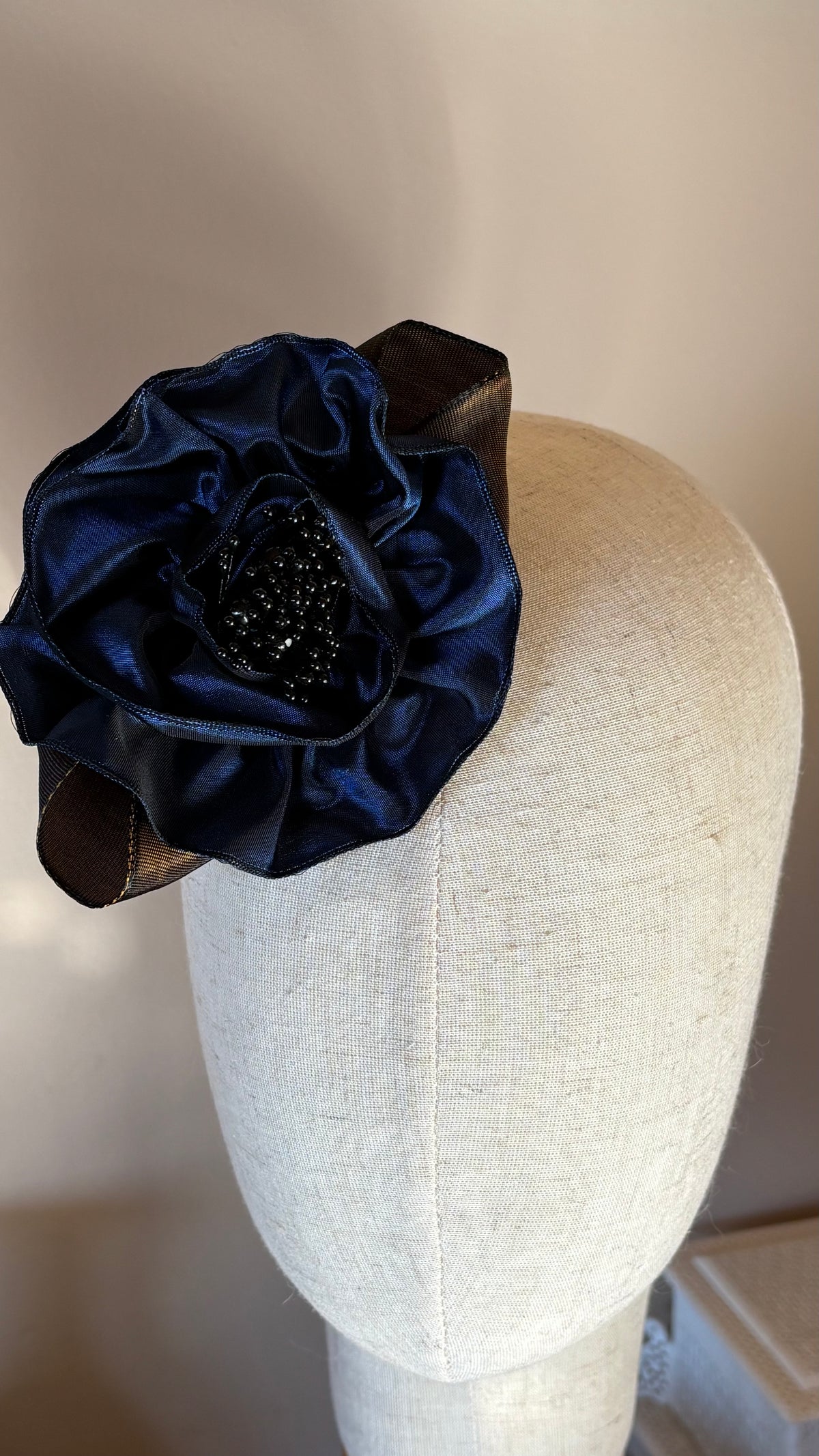 Francesca Petite Brooch & Clip in Navy. Pin or Clip to dresses, lapels, handbag or hat. Made in the USA. You can reshape the flower and leaves. Taffeta from France.