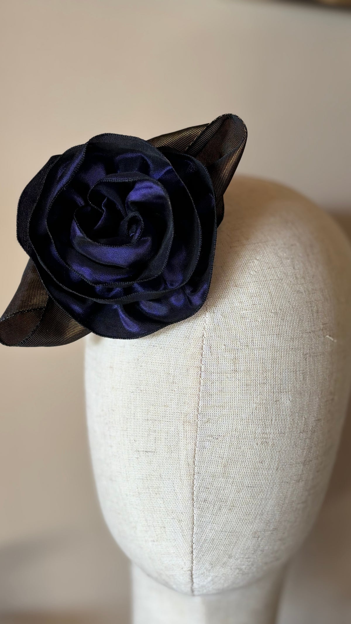 “Rosette” Brooch & Clip in Purple.  Pin or Clip to dresses, lapels, purse, hat or wear as a boutonniere. Made in the USA.  You can reshape the flower and leaves to make it larger or smaller.