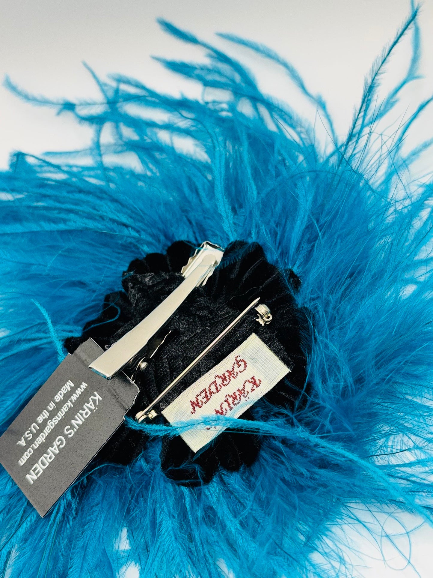 Dietrich Petite Ostrich Pin & Clip in Teal.  Handmade in the USA. Genuine Ostrich. Available in many colors.  Available in Petite or Grand