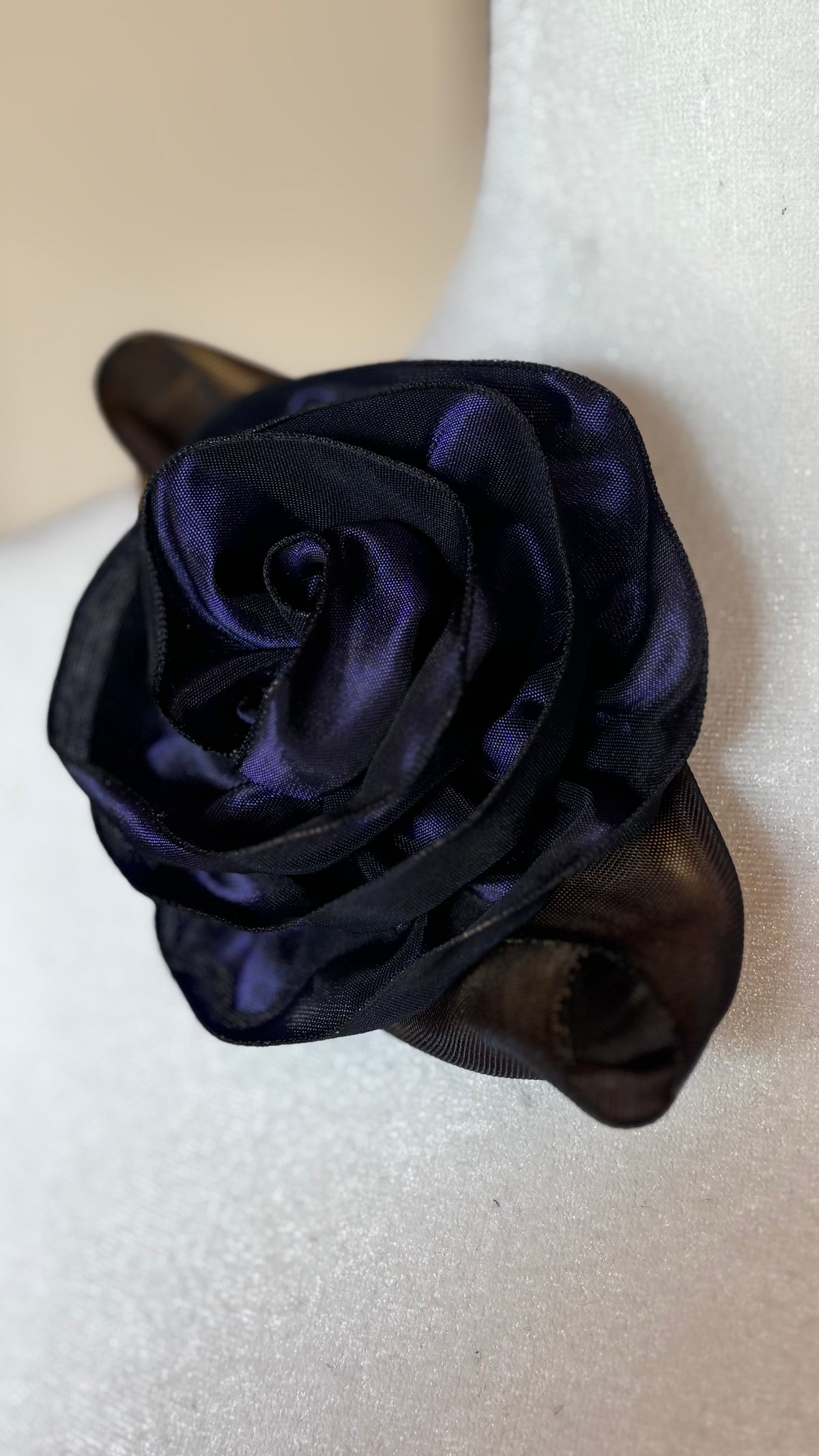 “Rosette” Brooch & Clip in Purple.  Pin or Clip to dresses, lapels, purse, hat or wear as a boutonniere. Made in the USA.  You can reshape the flower and leaves to make it larger or smaller.