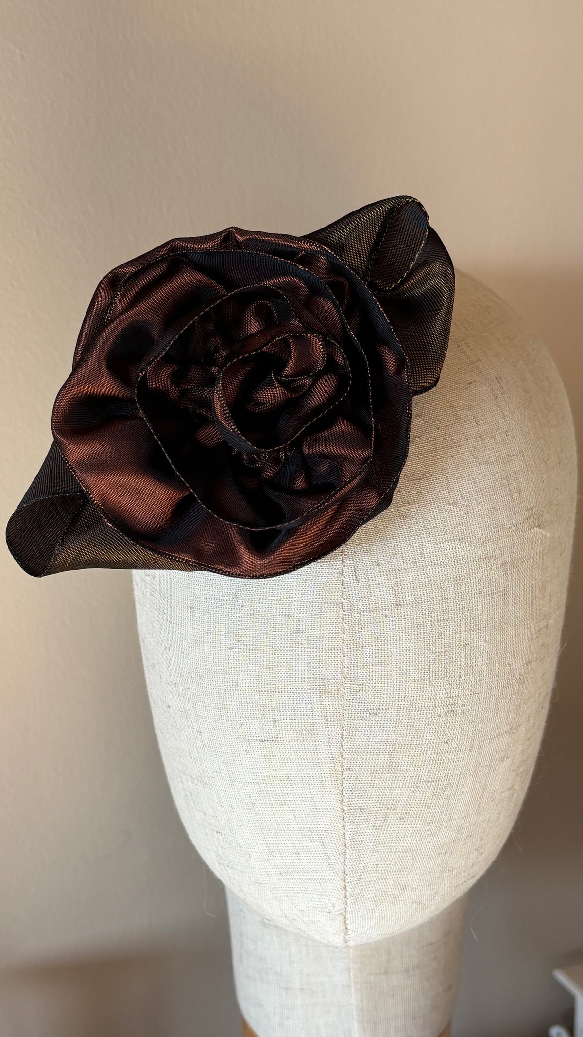 “Rosette” Brooch & Clip in Chestnut Brown.  Pin or Clip to dresses, lapels, purse, hat or wear as a boutonniere. Made in the USA.  You can reshape the flower and leaves to make it larger or smaller.