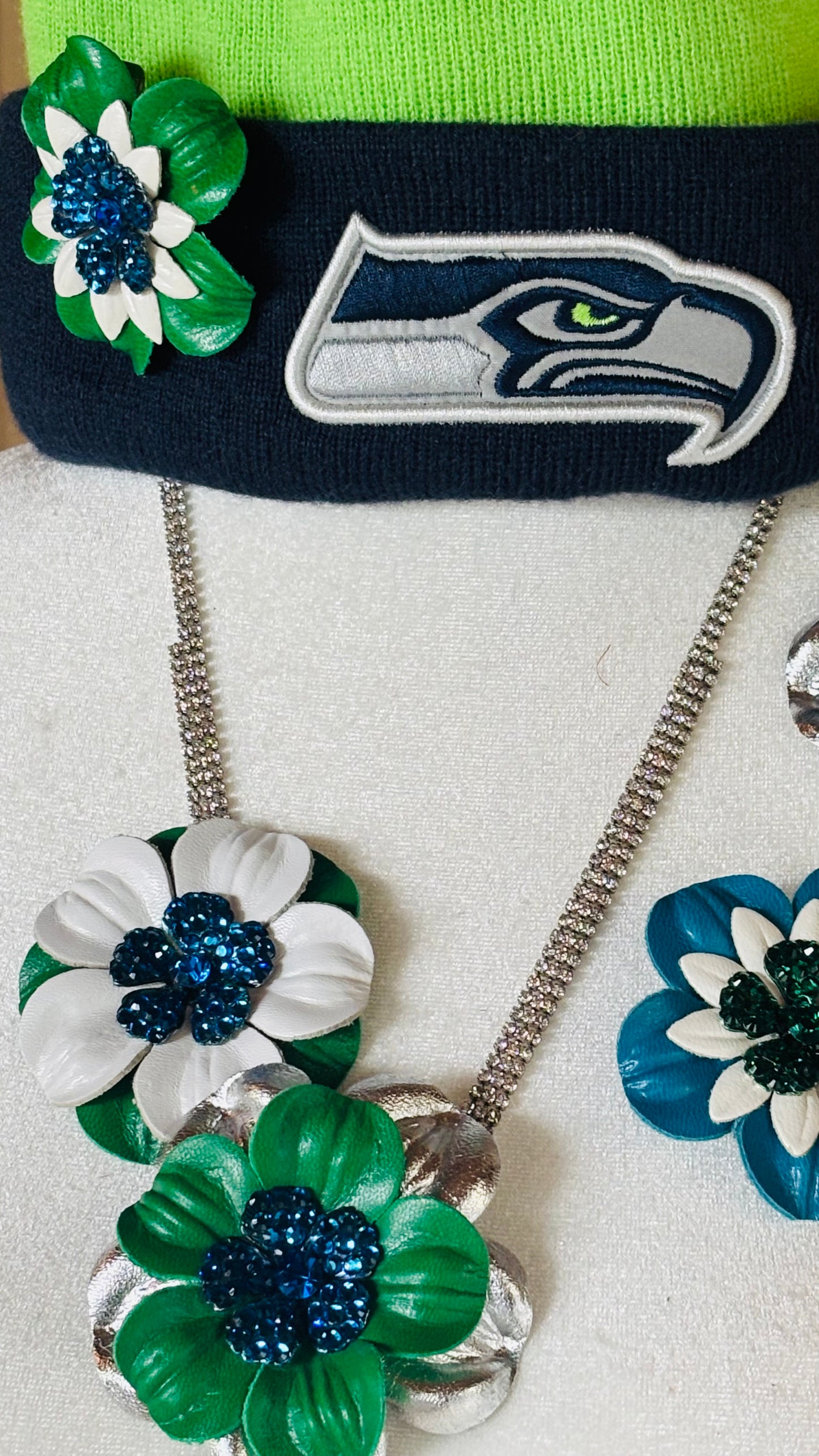 “Seahawks" 2.25 Petite Leather & Crystal Flower Pin & Clip. White with Blue Center. Made in Seattle, WA