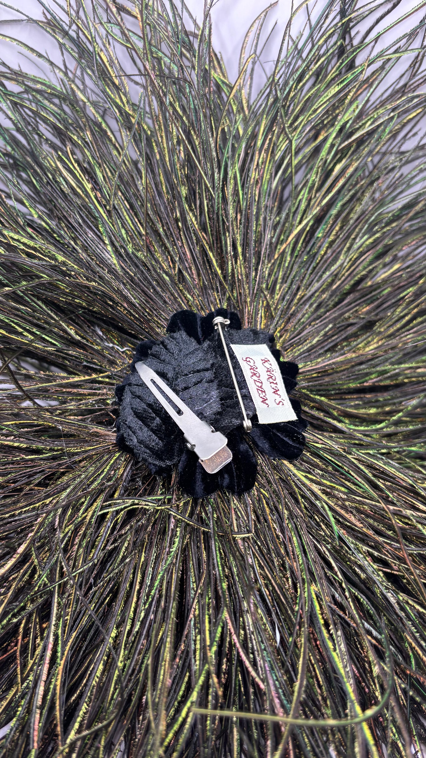 La Contessa Peacock Feather Fringe Brooch Clip.  Made in the USA.  A versatile statement Accessory