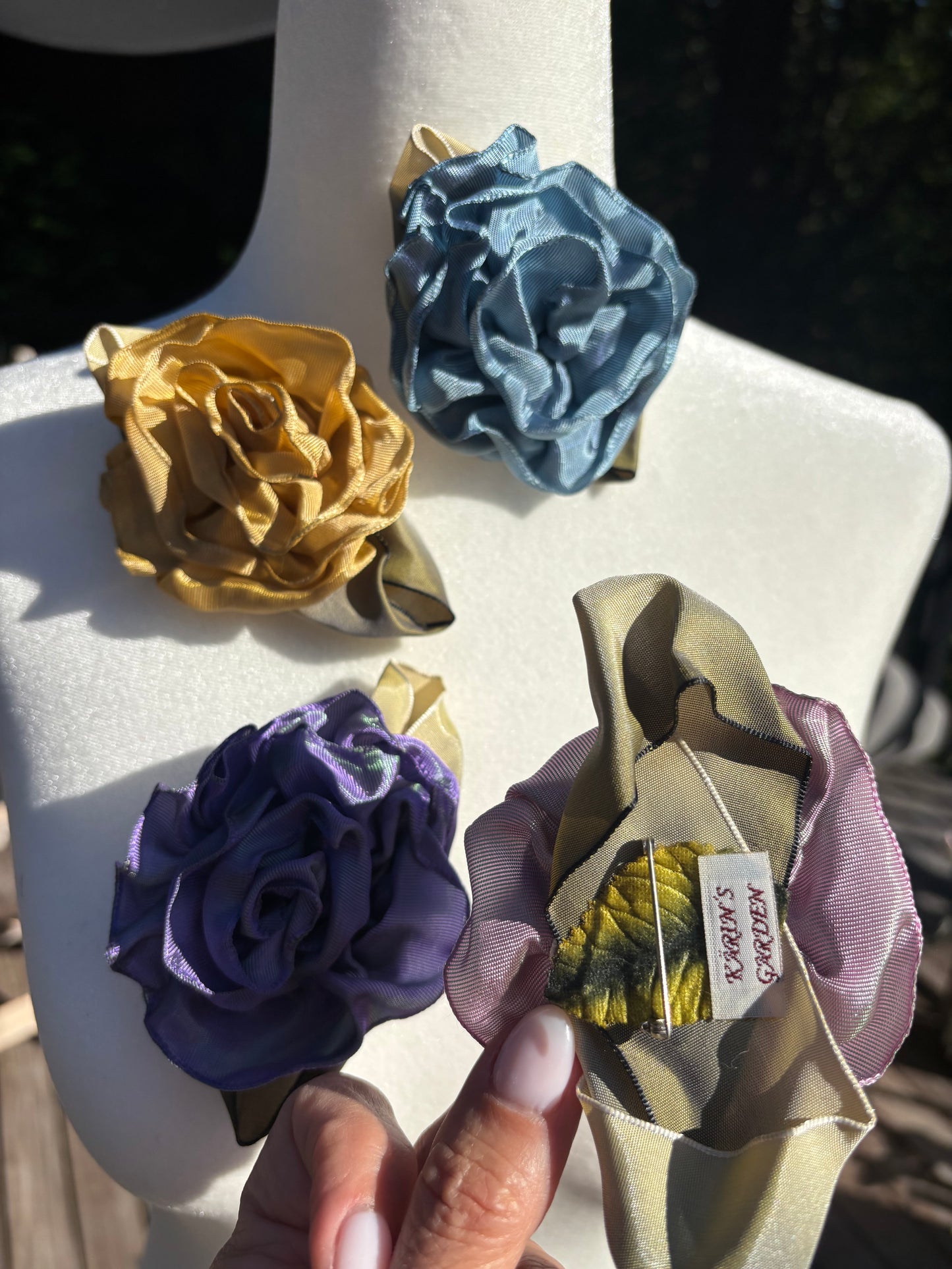 Karin's Garden 3" “Rosette” Pin.  Pin to dress, lapel or wear as a boutonniere. Made in the USA.  You can reshape the flower and leaves to make it larger or smaller.