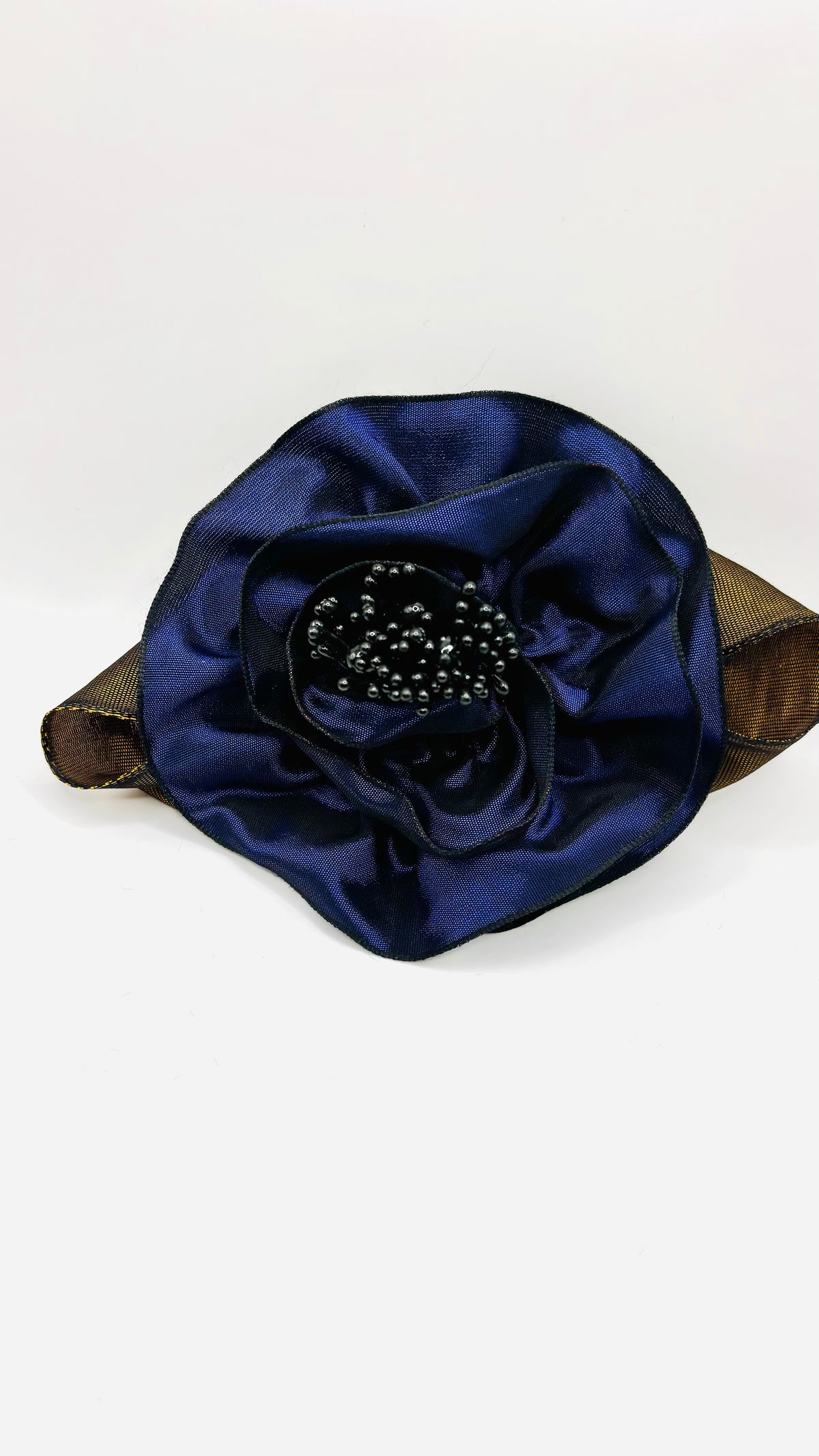 Francesca Petite Brooch & Clip in Navy.  Pin or Clip to dresses, lapels, handbag or hat.  Made in the USA.  You can reshape the flower and leaves.  Taffeta from France.