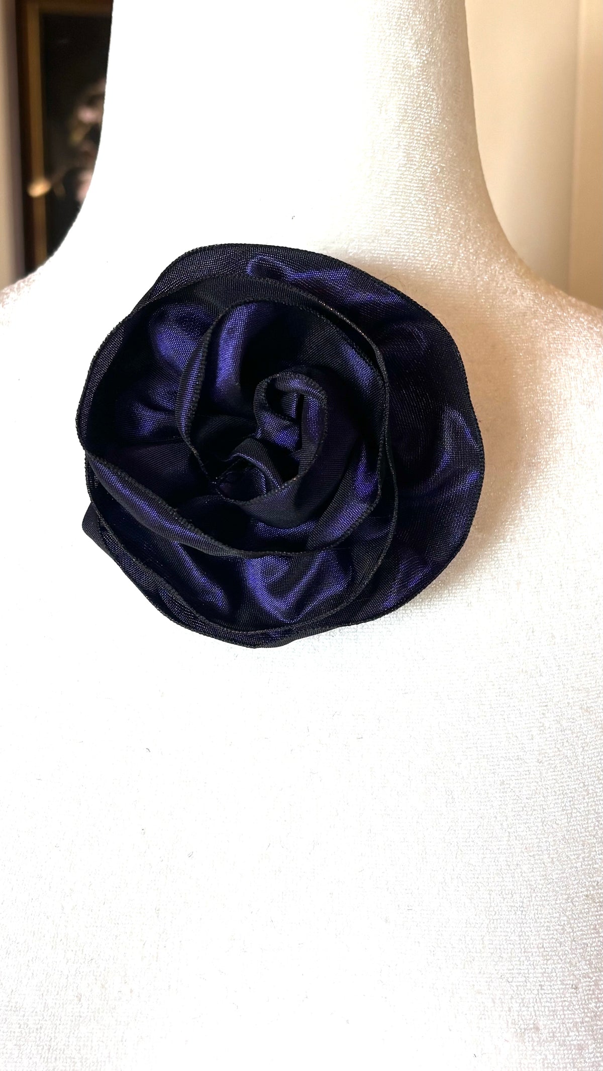 “Rosette” Brooch & Clip in Purple.  Pin or Clip to dresses, lapels, purse, hat or wear as a boutonniere. Made in the USA.  You can reshape the flower and leaves to make it larger or smaller.