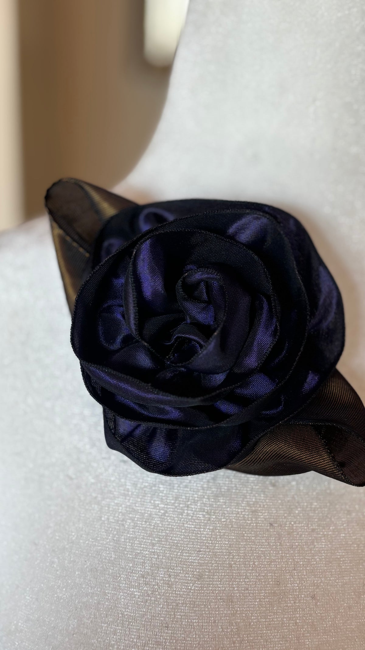 “Rosette” Brooch & Clip in Purple.  Pin or Clip to dresses, lapels, purse, hat or wear as a boutonniere. Made in the USA.  You can reshape the flower and leaves to make it larger or smaller.