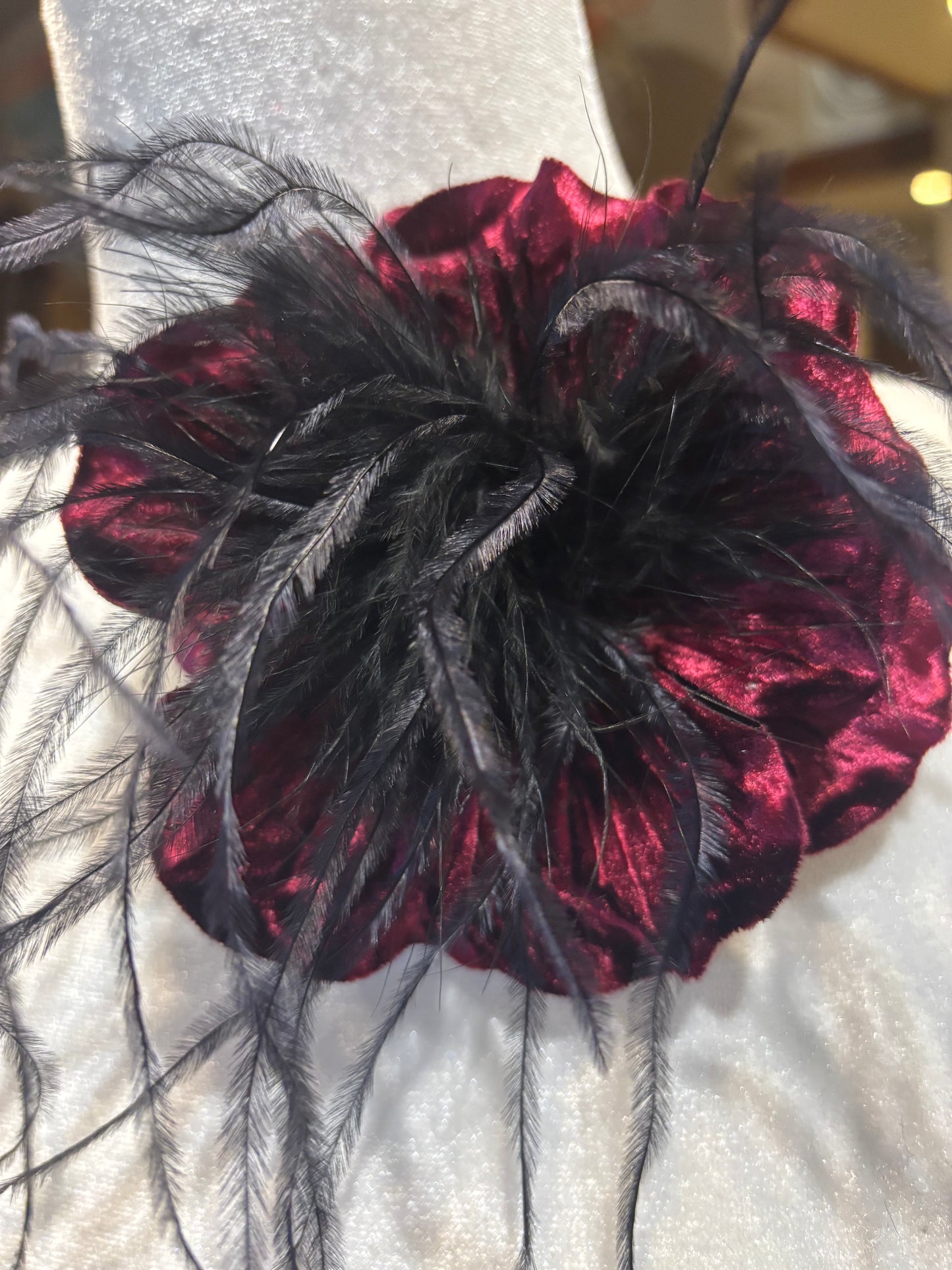 “Kitty" Burgundy Velvet Ostrich Flower Pin and Clip. Clip into hair, onto purse, dress, hat, wrist and more. A versatile accessory.
