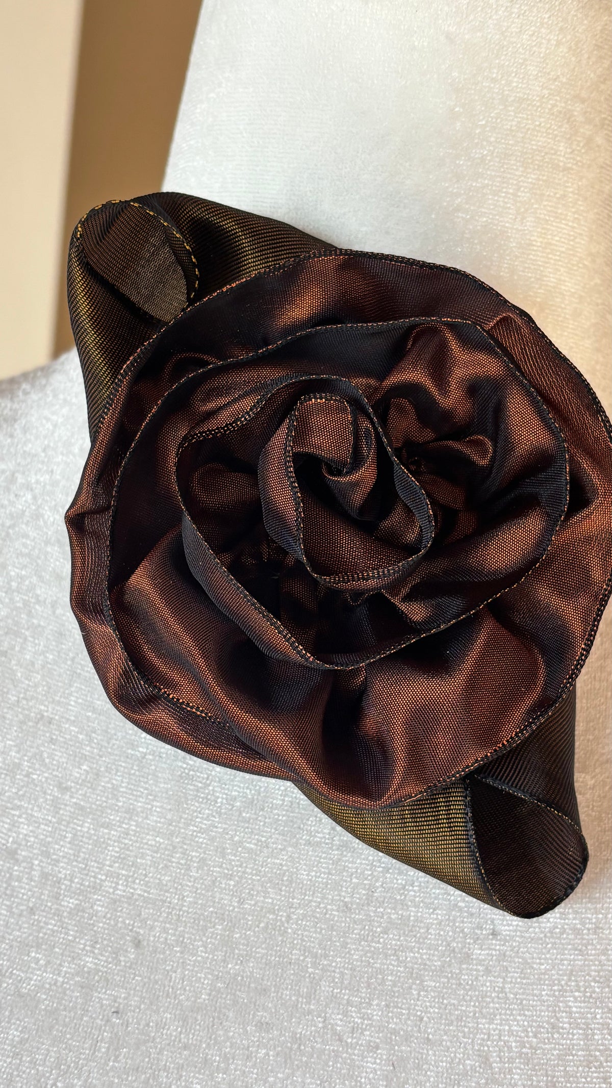 “Rosette” Brooch & Clip in Chestnut Brown.  Pin or Clip to dresses, lapels, purse, hat or wear as a boutonniere. Made in the USA.  You can reshape the flower and leaves to make it larger or smaller.