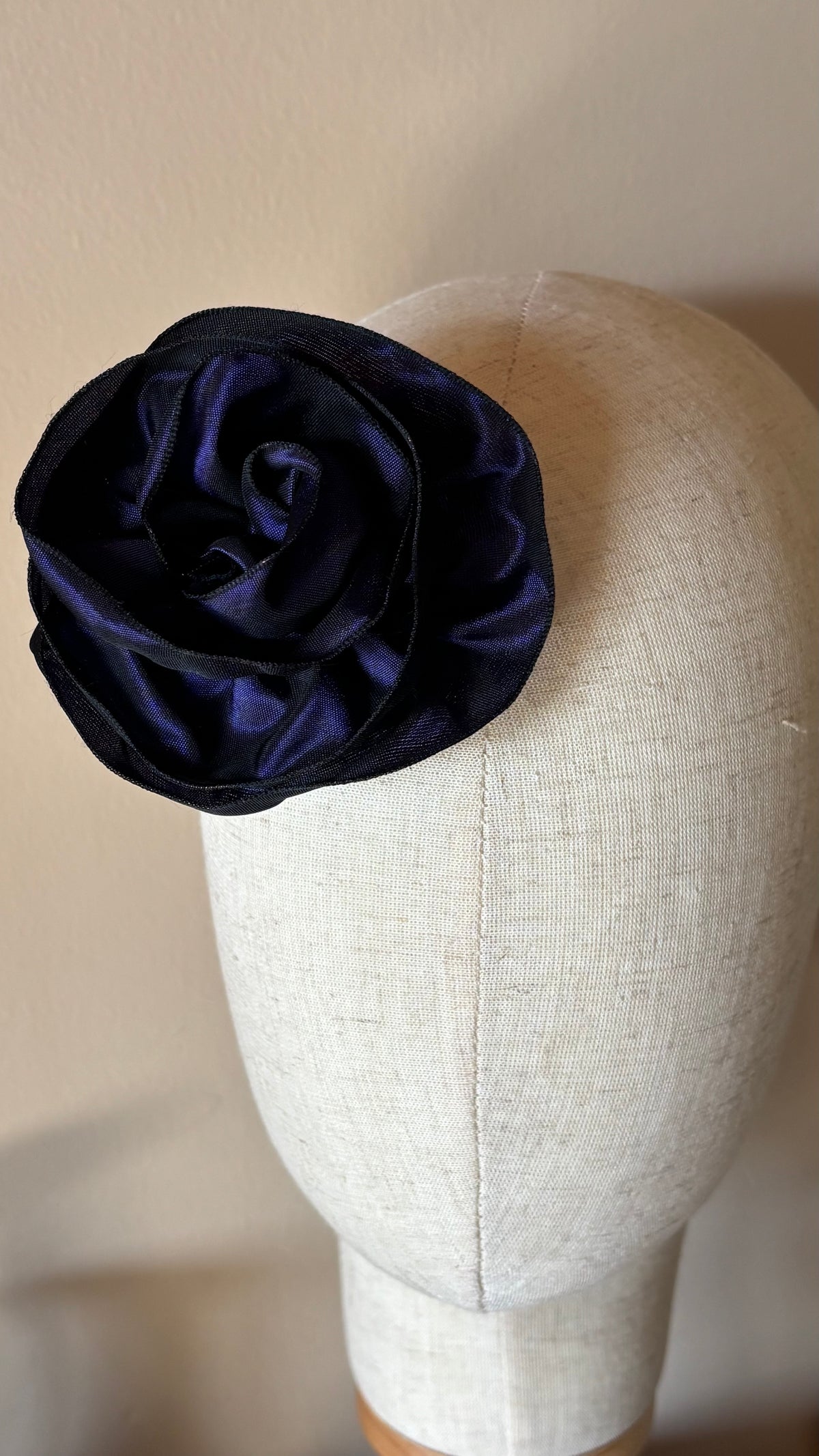 “Rosette” Brooch & Clip in Purple.  Pin or Clip to dresses, lapels, purse, hat or wear as a boutonniere. Made in the USA.  You can reshape the flower and leaves to make it larger or smaller.