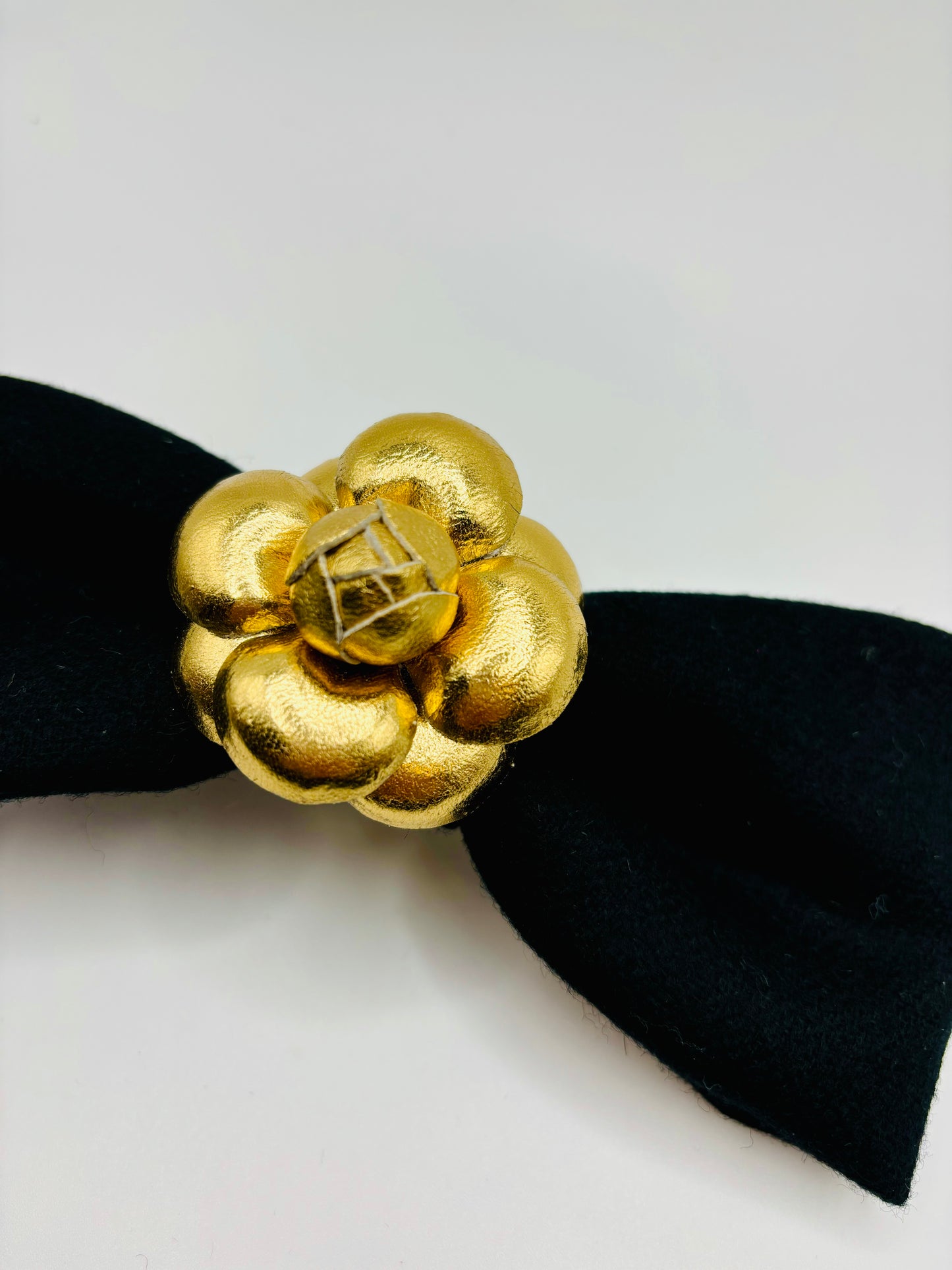 Karin’s Garden 5th Ave Mia Wool Bow Barrette with 2" Leather Camellia.  Made in the USA.  Metal Auto Barrette from France