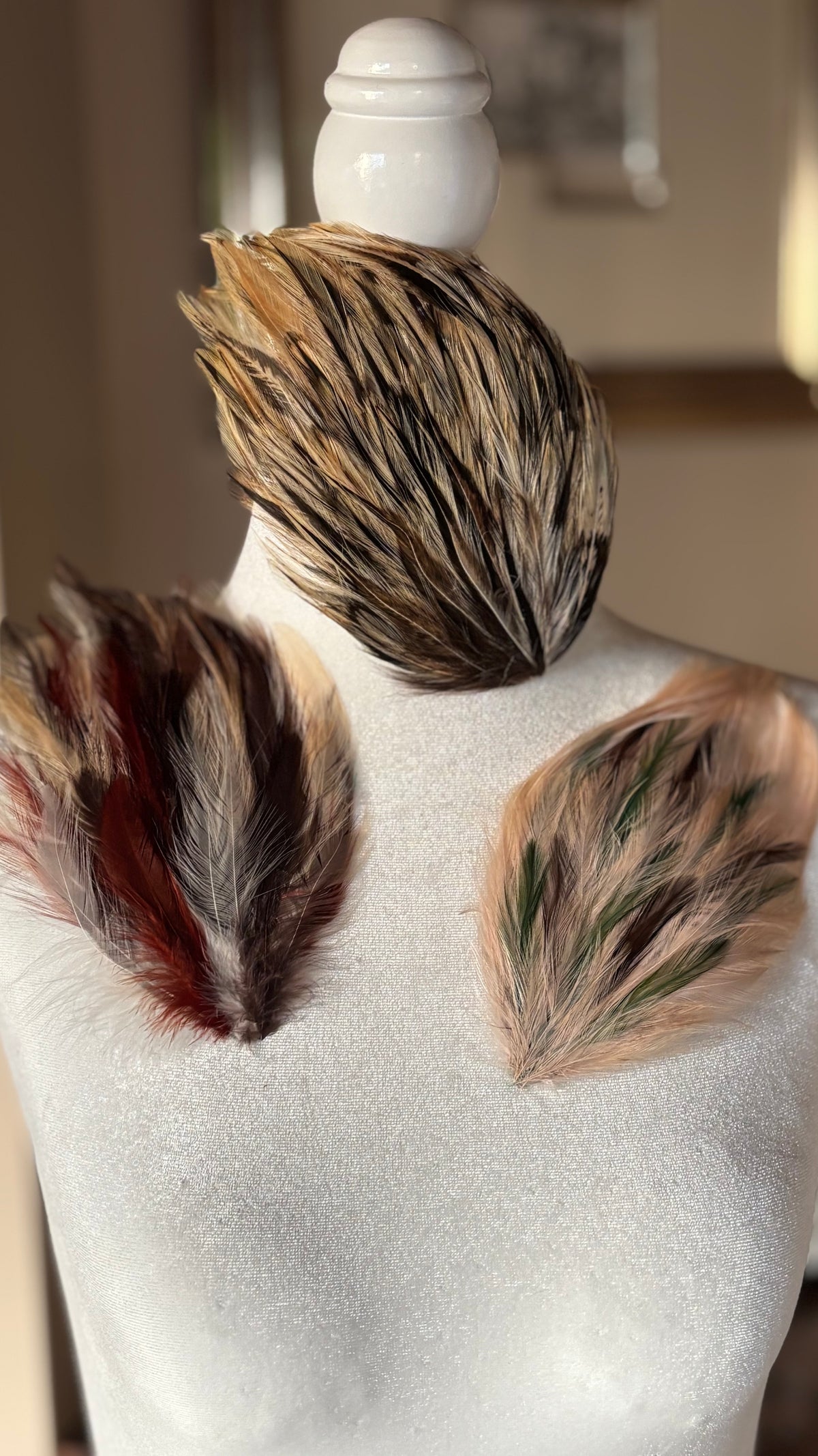 Three autumn Garbo feather pins in Ivory Brown, Ivory Olive Brown and Brick Brown Ivory